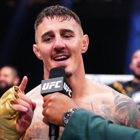 Watch Tom Aspinall sign ‘Jon Jones rubber duck’ for fan